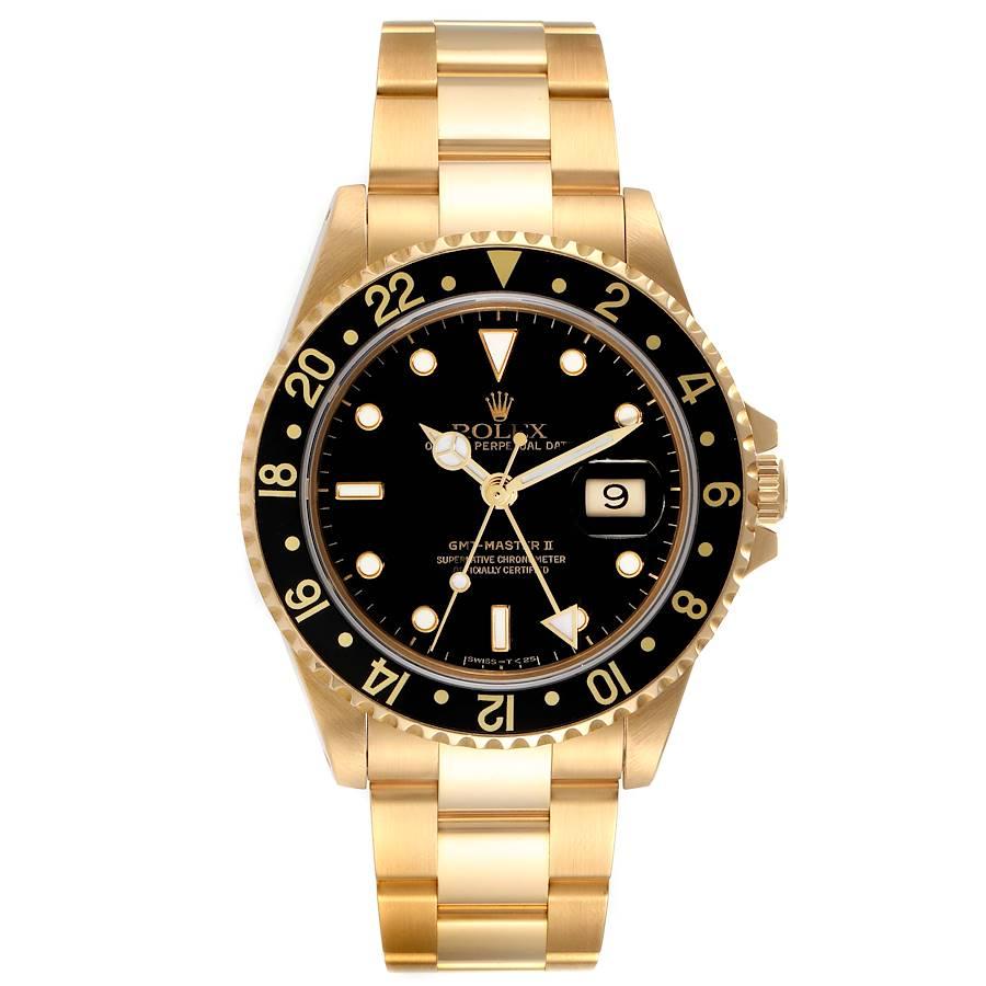 Rolex GMT Master 18K Gelbgold schwarzes Zifferblatt Herrenuhr 16718 Box Service-Karte. Offiziell zertifiziertes Chronometerwerk mit automatischem Aufzug. gehäuse aus 18 Karat Gelbgold mit einem Durchmesser von 40,0 mm. Rolex-Logo auf einer Krone.