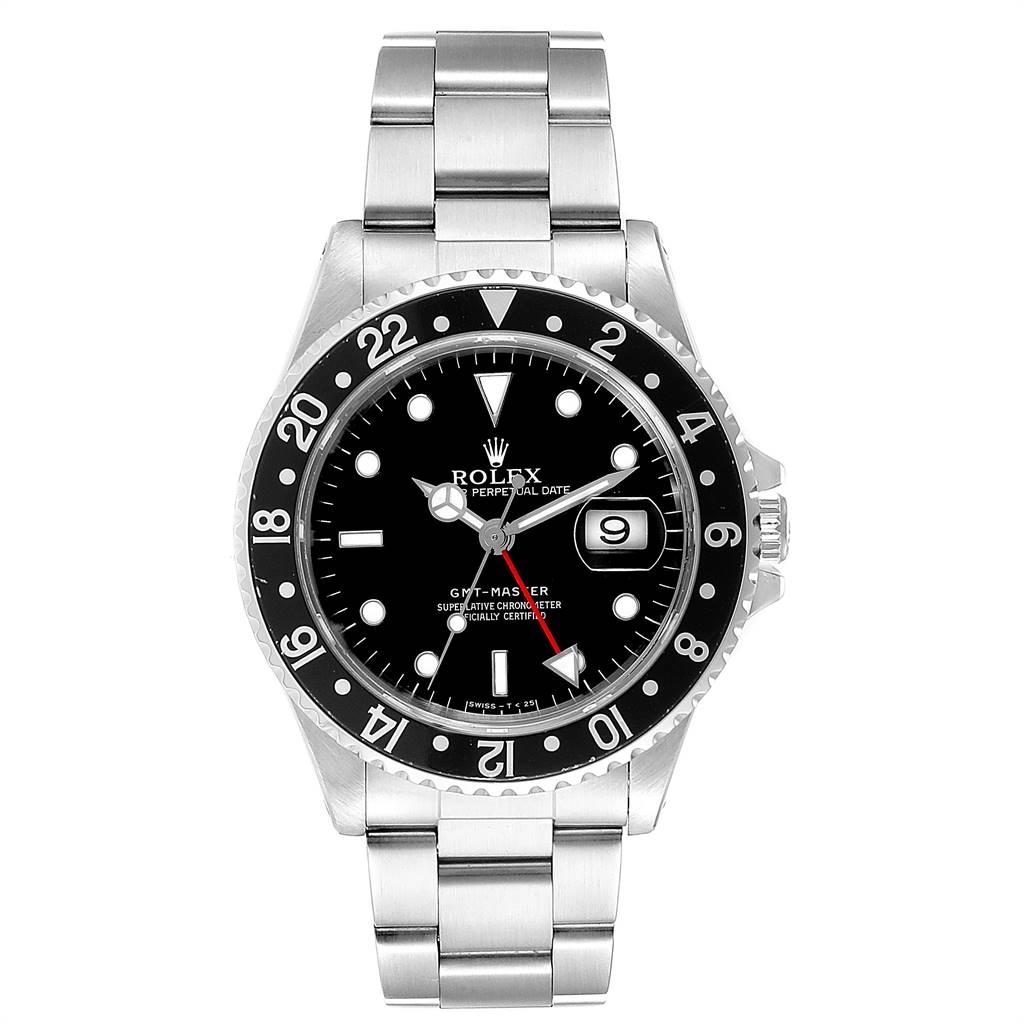 Rolex GMT Master Black Bezel Automatic Steel Mens Watch 16700. Officially certified chronometer self-winding movement. Stainless steel case 40.0 mm in diameter. Rolex logo on a crown. Bidirectional rotating bezel with a special 24-hour black bezel