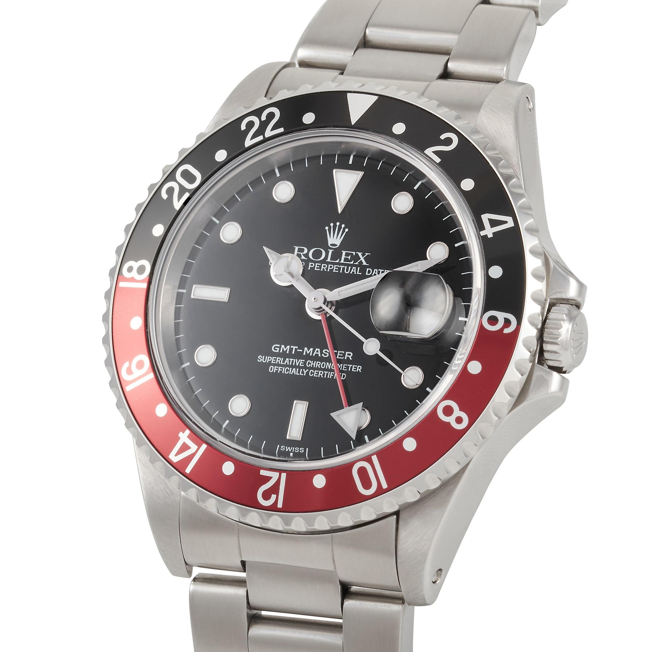 This Rolex GMT-Master Coke Watch, features an oystersteel case measuring 40mm in diameter with a 24 hour rotatable ceramic red and black bezel known by watch collectors as the 