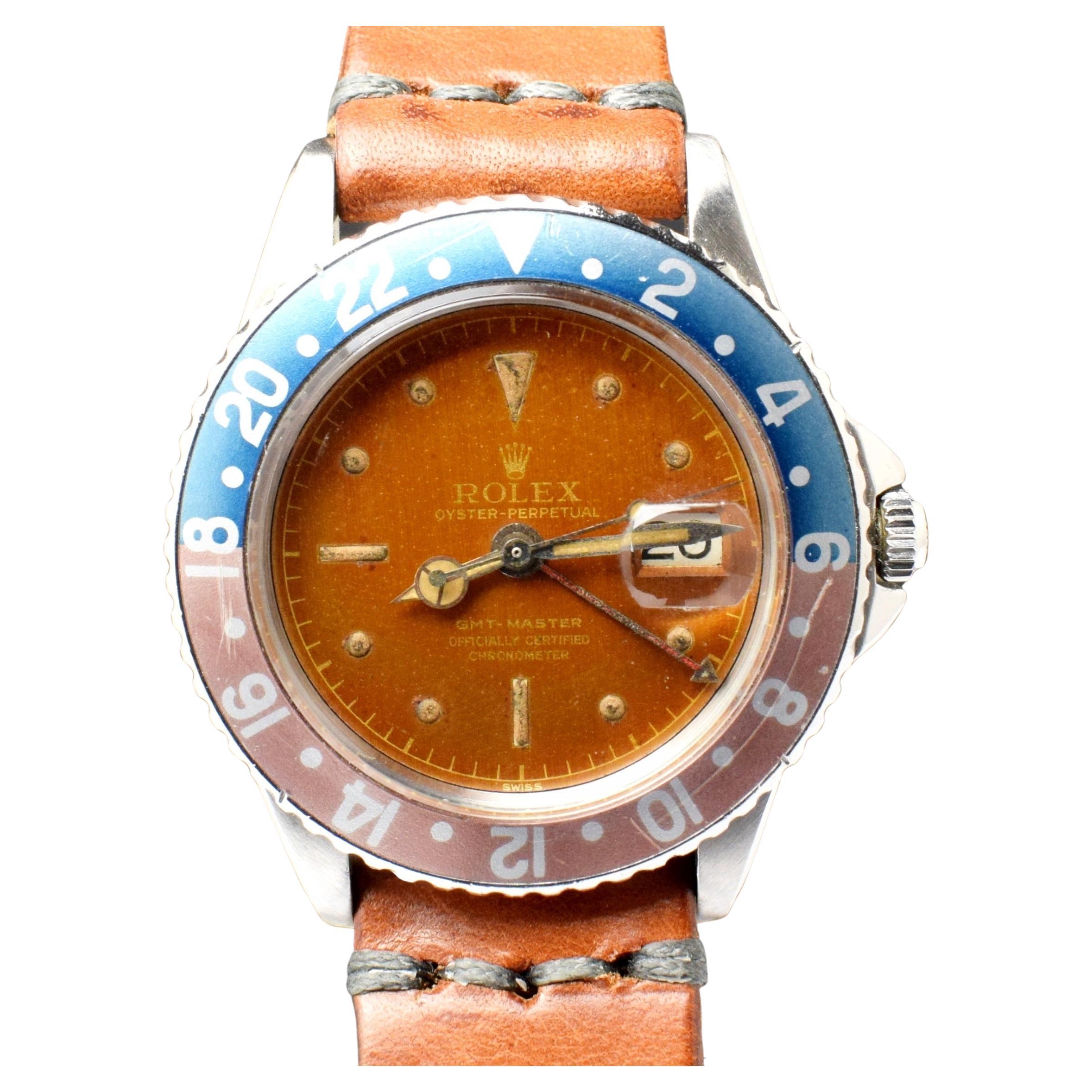 Rolex GMT-Master Glossy Tropical Gilt O.C.C. Dial 1675 Steel Watch, 1960