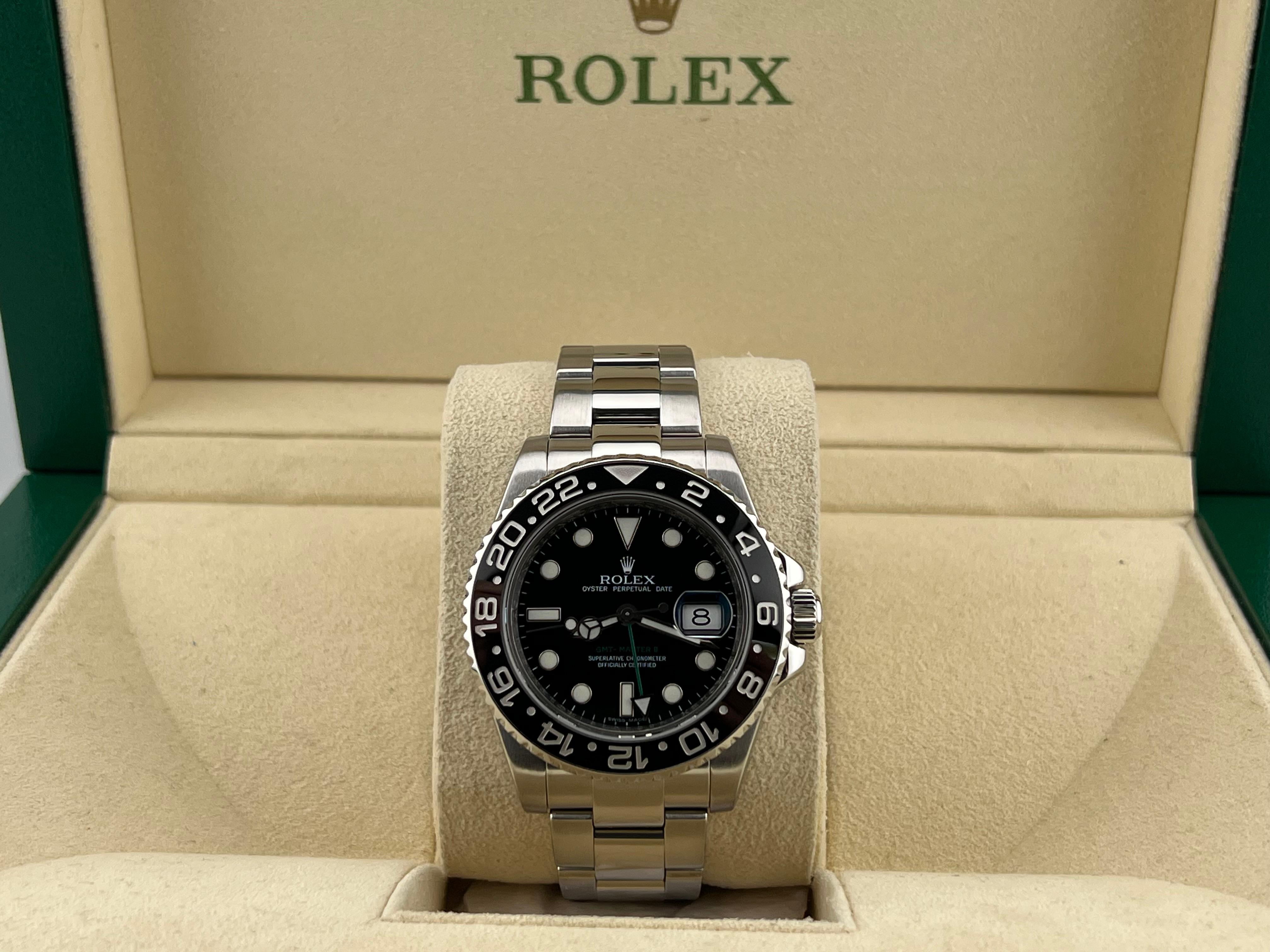 Style Number: 116710



Year: 2008

 

Model: Rolex GMT Master II 

 

Case Material: Stainless Steel 

 

Band: Stainless Steel 

  

Bezel: Black Ceramic 

  

Dial: Black 

 

Face: Sapphire Crystal 

 

Case Size: 40mm 

 

Includes: 

-Elegant