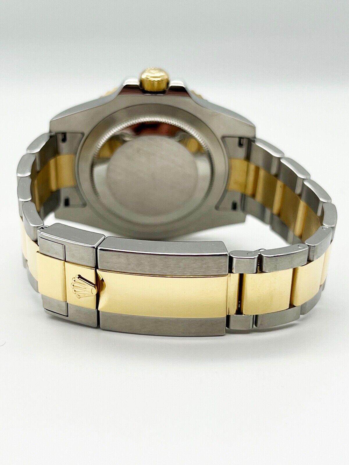Rolex GMT Master II 116713 Schwarzes Zifferblatt 18K Gelbgold Edelstahl Box Papier 2