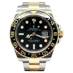 Rolex GMT Master II 116713 Schwarzes Zifferblatt 18K Gelbgold Edelstahl Box Papier