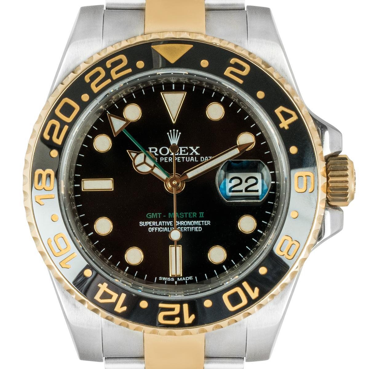 A GMT-Master II in stainless steel and yellow gold by Rolex. Featuring a black dial with a date aperture and a green second-time zone hand. The bidirectional rotatable bezel features a 24-hour display. Equipped with an Oyster bracelet and an