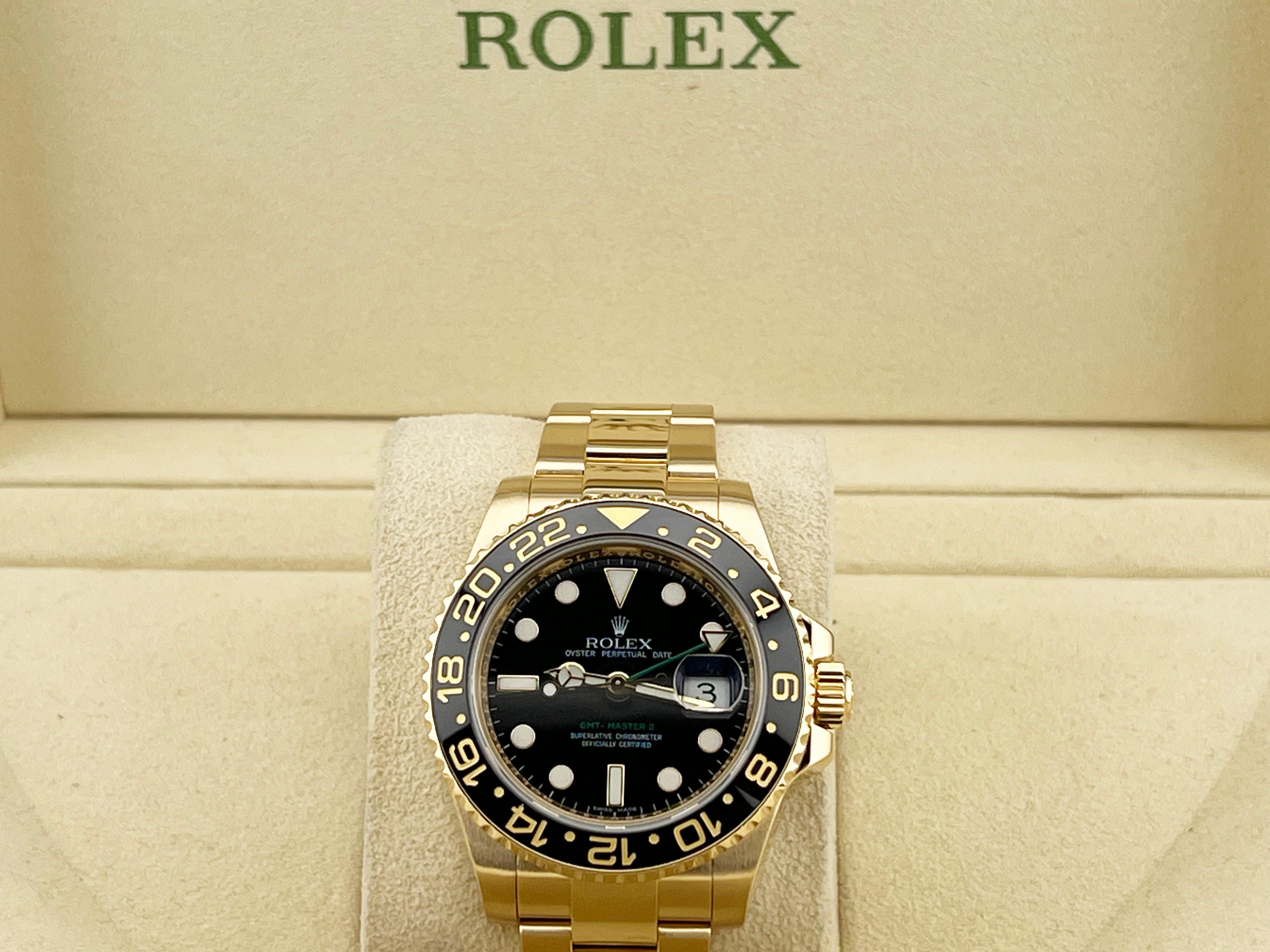 Style Number: 116718



Year: 2007

 

Model: Rolex GMT Master II

 

Case Material: 18K Yellow Gold 

 

Band: 18K Yellow Gold 

  

Bezel: Black Ceramic Bezel 

  

Dial: Black Dial 

 

Face: Sapphire Crystal 

 

Case Size: 40mm 

 

Includes: