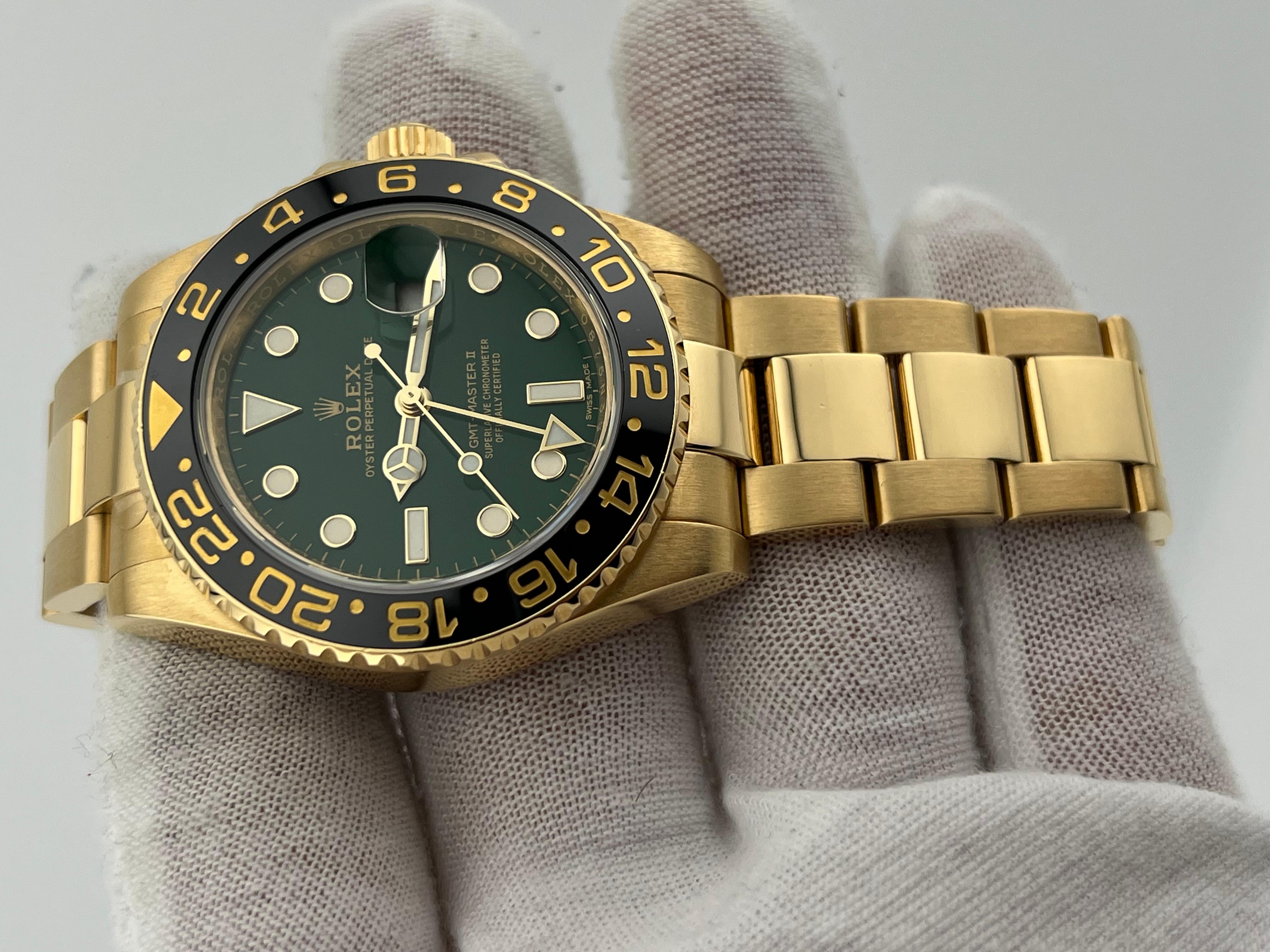 Rolex GMT Master II 116718LN Green Dial Black Bezel 18K Yellow Gold Box Paper In Excellent Condition In San Diego, CA