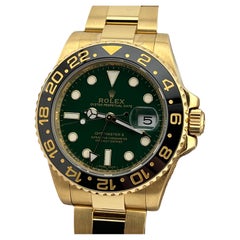 Rolex GMT Master II 116718LN Quadrante verde Lunetta nera Oro giallo 18 carati Scatola di carta