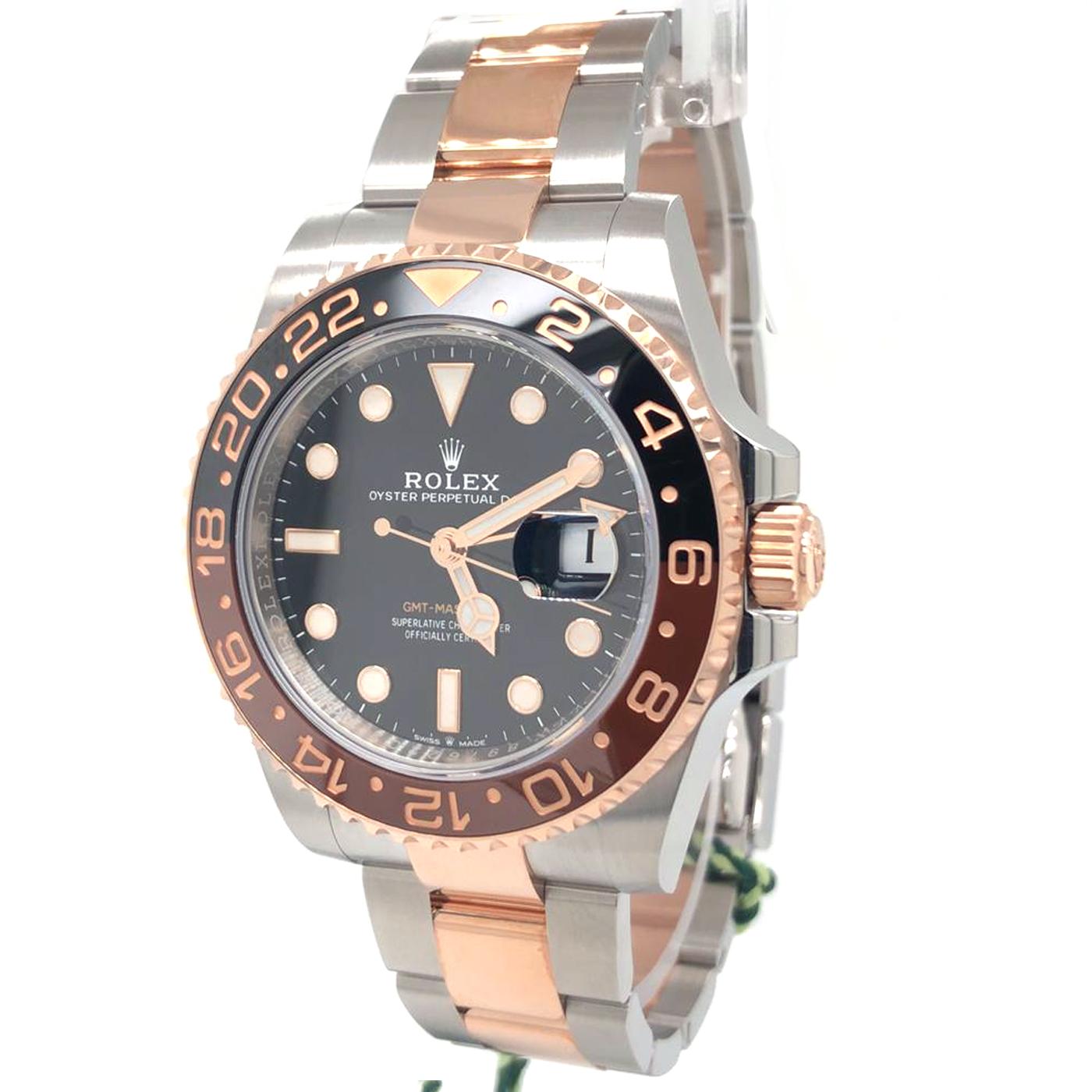 Rolex 126711 GMT-Master II 40mm Root Beer Black Dial Black/Brown Ceramic Bezel Stainless Steel and Rose Gold

Launched in 1954, the GMT Master (GMT = Greenwich Mean Time) was designed in collaboration with Pan American Airways. Having an accurate