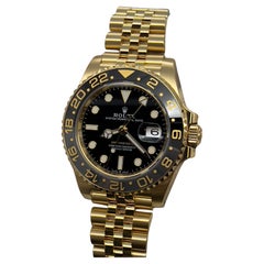 Rolex GMT Master II 126718GRNR 40mm 18K Gelbgold Jubiläumsband Box Papier 2023