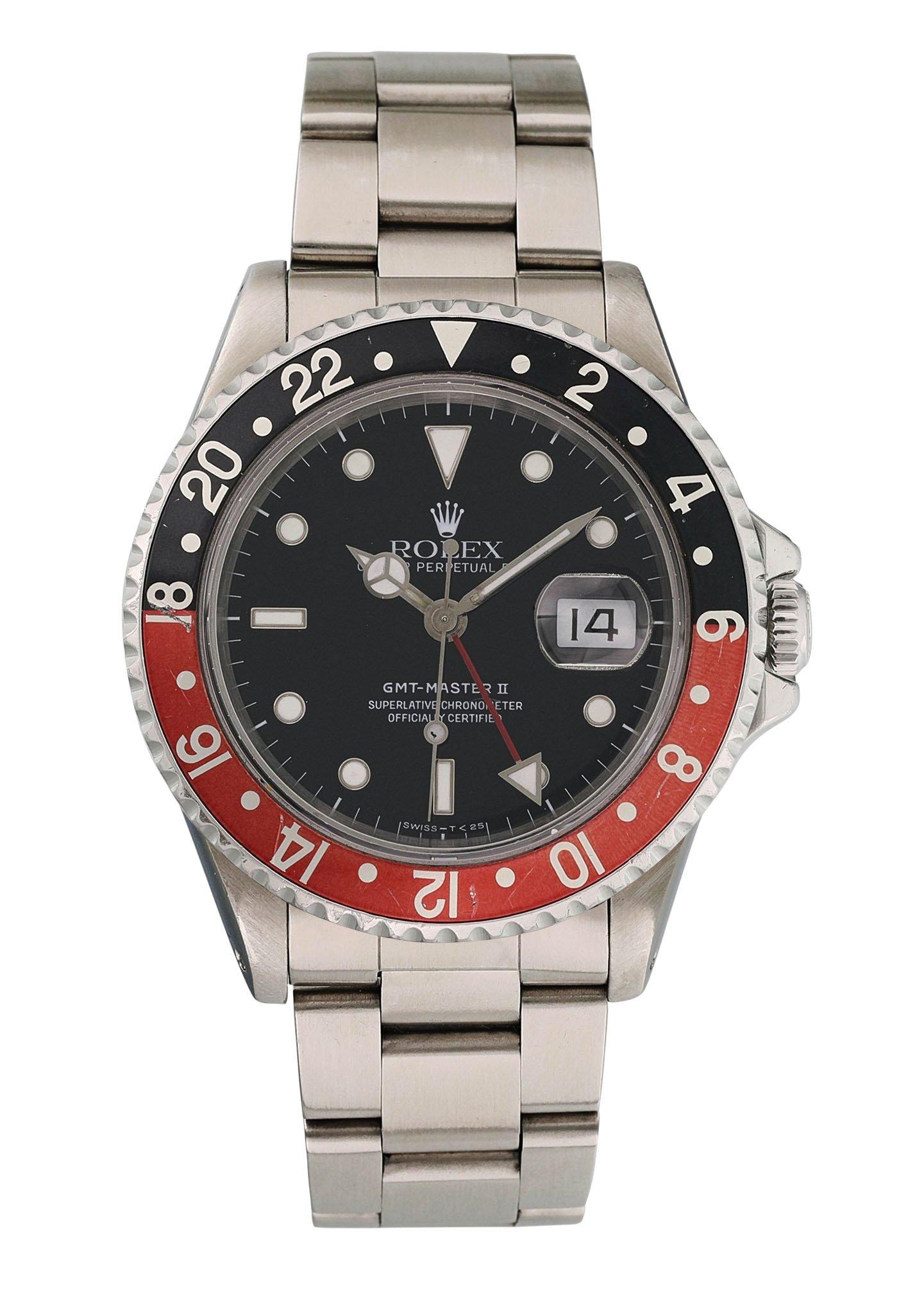 Rolex GMT Master II 16710 Men Watch. 
40mm Stainless Steel case. 
Stainless Steel Bidirectional Coke bezel. 
Black dial with Luminous Steel hands and index, dot hour markers. 
Minute markers on the outer dial. 
Date display at the 3 o'clock
