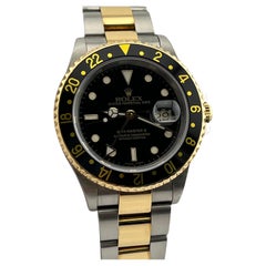 Rolex GMT Master II 16713 40mm Esfera Negra Oro Amarillo 18K Caja Acero Papel 2001