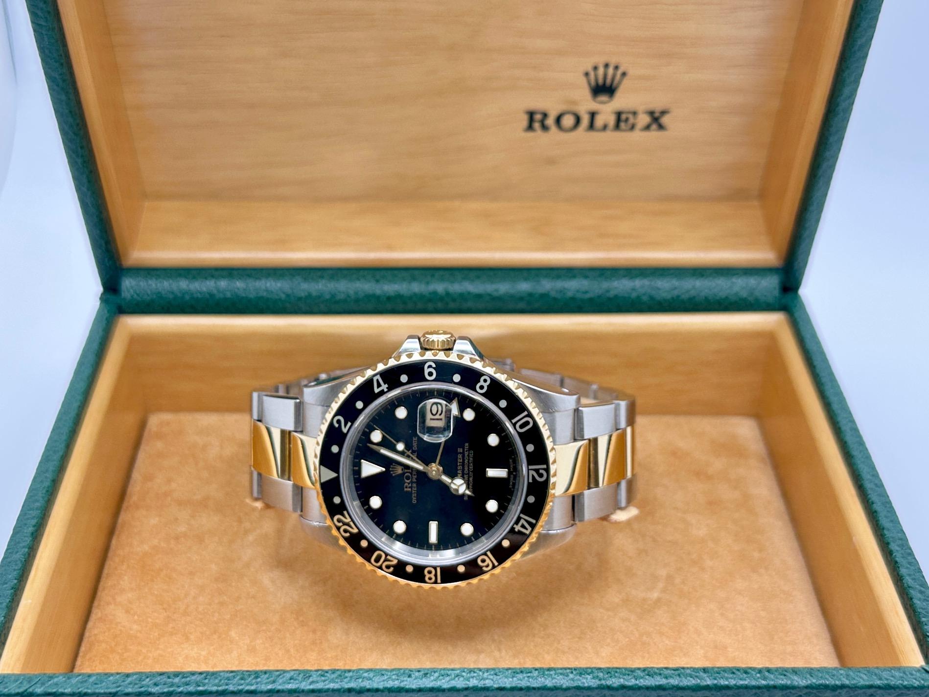 Rolex GMT Master II 16713 40mm Black Dial 18K Yellow Gold Steel Box Paper 2002 In Excellent Condition For Sale In San Diego, CA