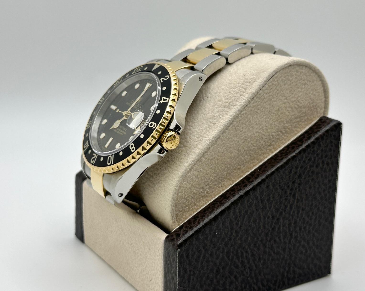 Men's Rolex GMT Master II 16713 40mm Black Dial 18K Yellow Gold Steel Box Paper 2002 For Sale