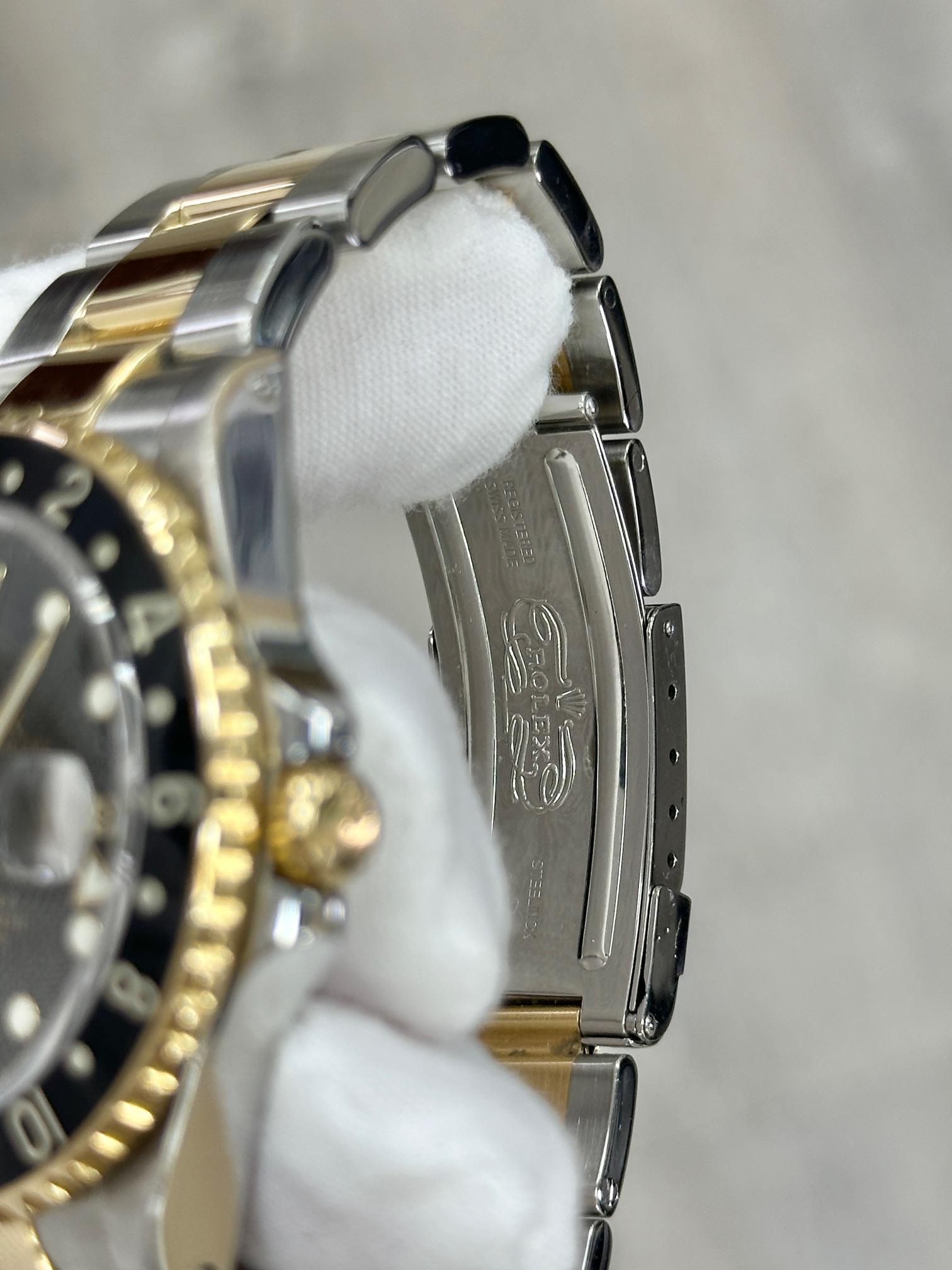 Rolex GMT Master II 16713 40mm Black Dial 18K Yellow Gold Steel Box Paper 2002 For Sale 2