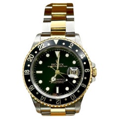 Rolex GMT Master II 16713 40mm Black Dial 18K Yellow Gold Steel Box Paper 2002
