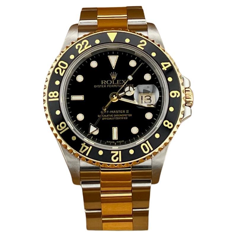 Rolex GMT Master II 16713 40mm Cadran noir Or jaune 18k Acier Boîte Papiers 2005