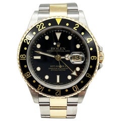 Rolex GMT Master II 16713 Schwarzes Zifferblatt 18K Gelbgold Edelstahl 2003