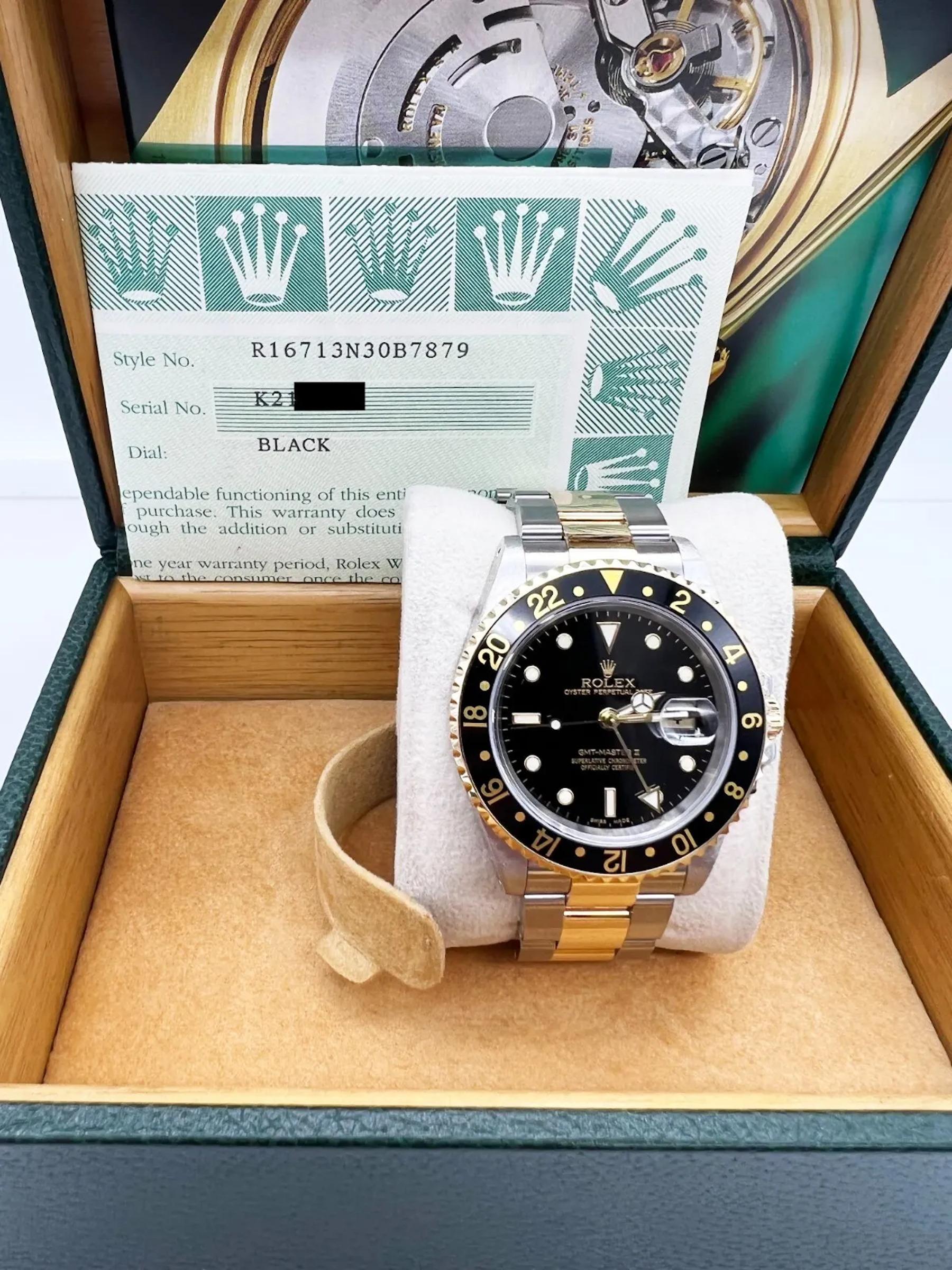 Rolex GMT Master II 16713 Black Dial 18K Yellow Gold Stainless Steel Box Paper In Excellent Condition For Sale In San Diego, CA