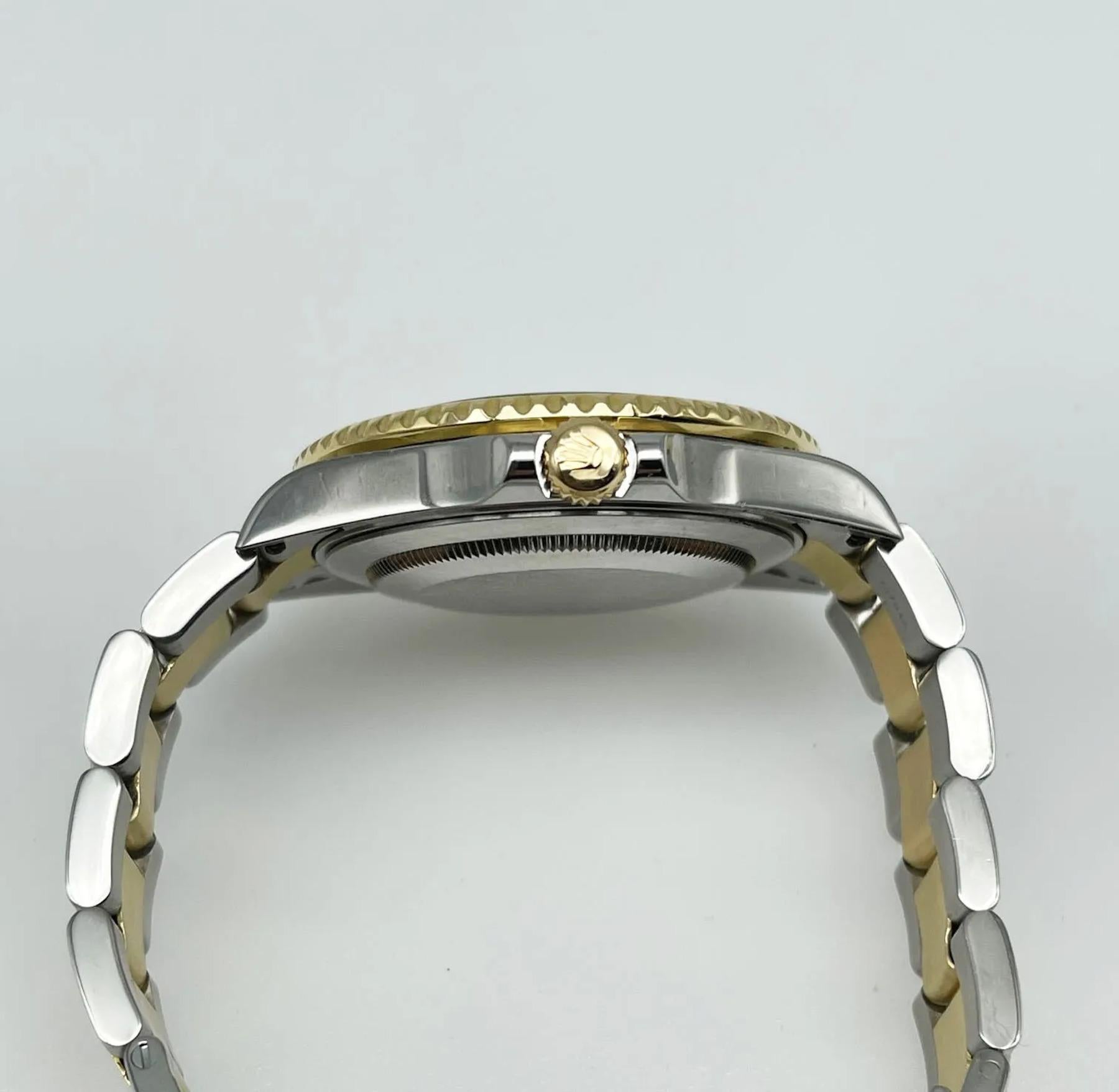 Men's Rolex GMT Master II 16713 Black Dial 18K Yellow Gold Stainless Steel Box Paper For Sale