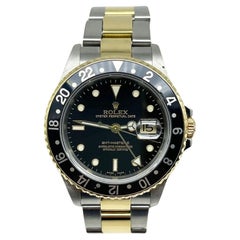 Rolex GMT Master II 16713 Black Dial 18K Yellow Gold Stainless Steel Box Paper