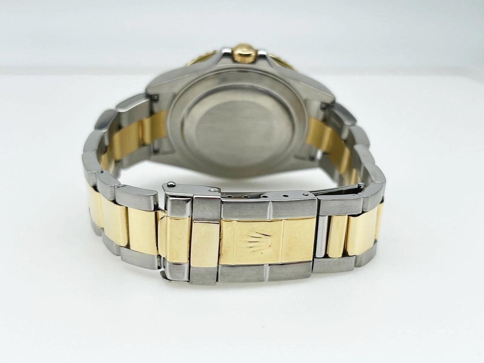 Rolex GMT Master II 16713 Schwarzes Zifferblatt 18K Gelbgold Stahl 40mm Box Papier 2006 im Angebot 4