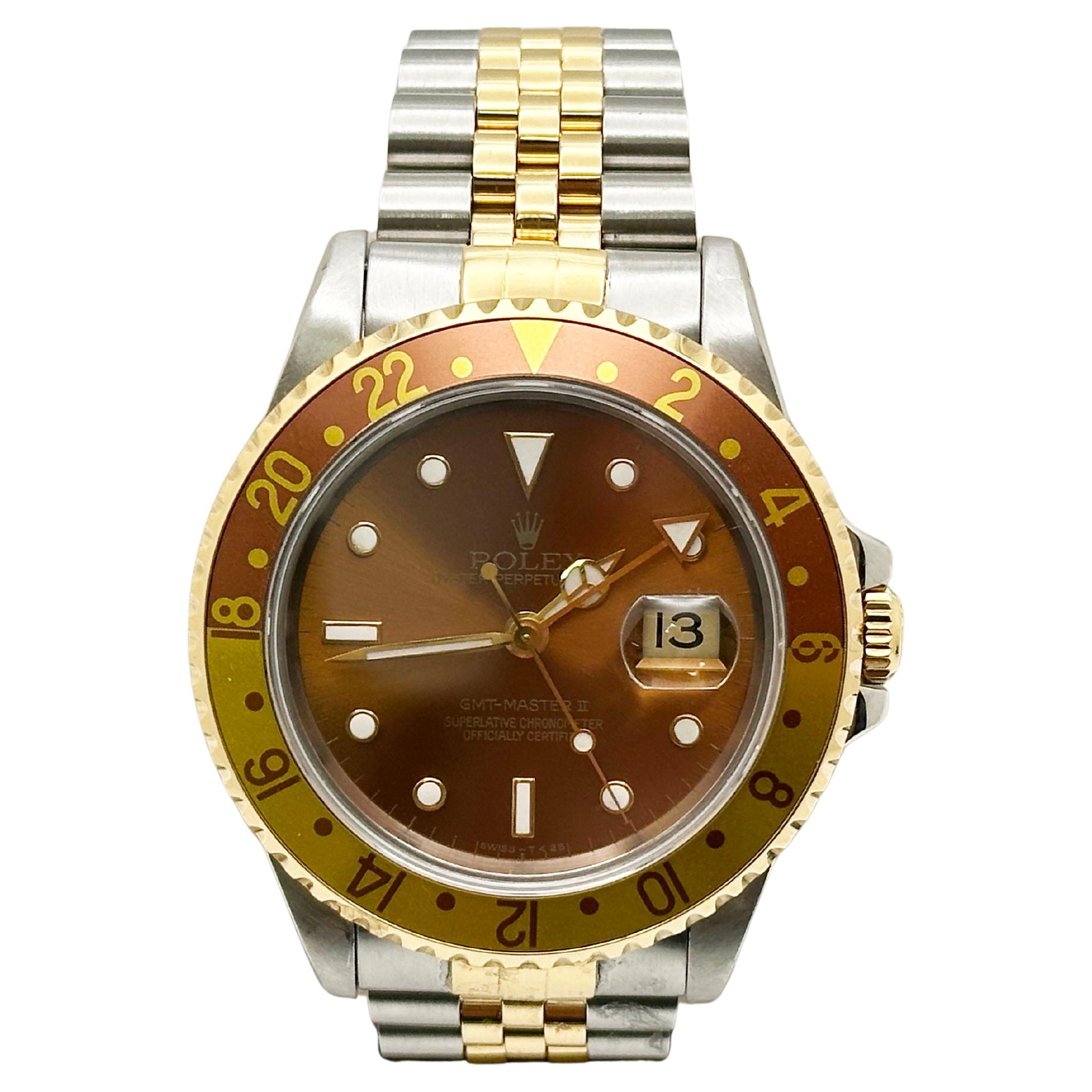 Rolex GMT Master II 16713 Root Beer 18K Gelbgold Edelstahl Box Papier