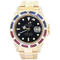 Rolex GMT Master II 16718 Heavy 18k Gold Diamond Ruby Sapphire Bezel Mens Watch