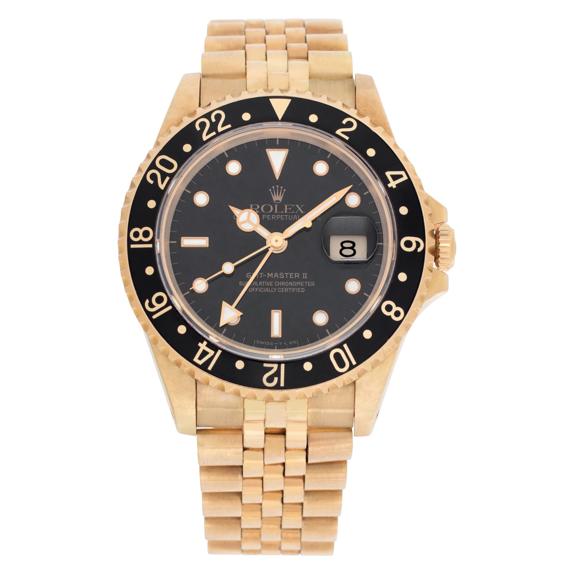 Rolex GMT-Master II 16718 in yellow gold with aBlack dial 40mm Automatic watch For Sale
