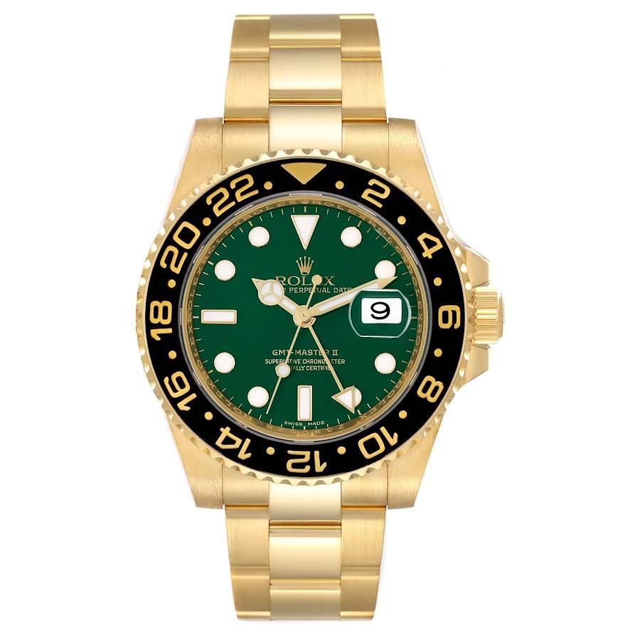 Rolex GMT Master II 18K Yellow Gold Green Dial Mens Watch 116718. Officially certified chronometer self-winding movement. 18K yellow gold case 40.0 mm in diameter. Rolex logo on a crown. 18k yellow gold bidirectional rotating bezel with a special