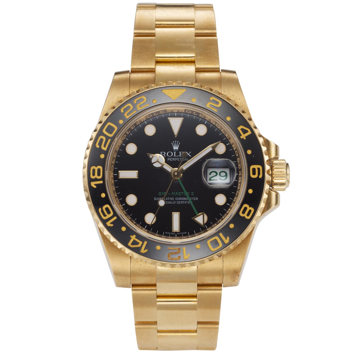The Rolex GMT Master II is one of Rolex's finest creations. Designed in an 18k yellow gold case featuring a black Cerachrom on the bidirectional bezel, a monobloc middle case, a screw-down case back, and a winding crown. Its black dial features