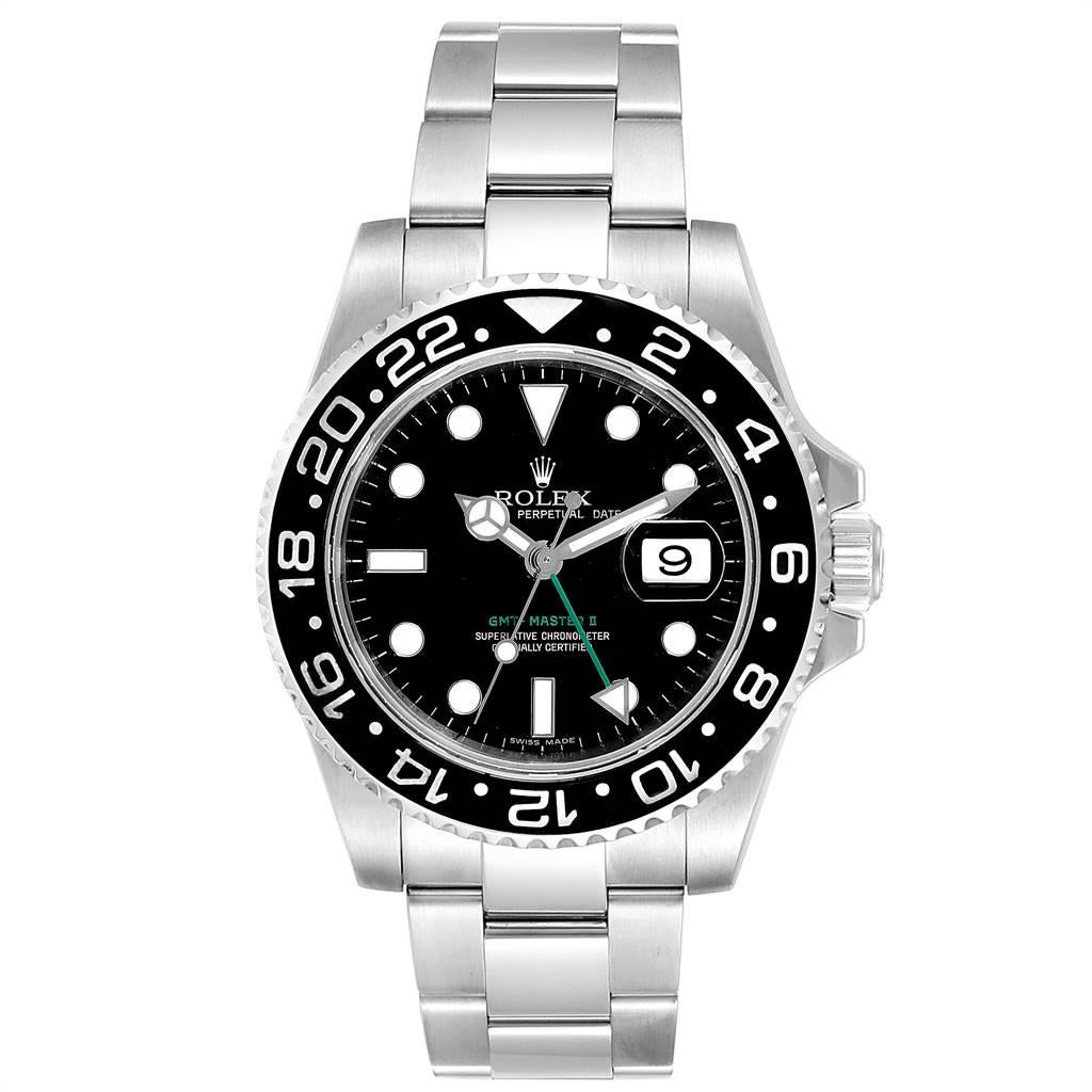 Rolex GMT Master II 40mm Black Dial Green Hand Mens Watch 116710. Officially certified chronometer self-winding movement. Stainless steel case 40.0 mm in diameter. Rolex logo on a crown. Stainless steel bidirectional rotating ceramic bezel. Scratch