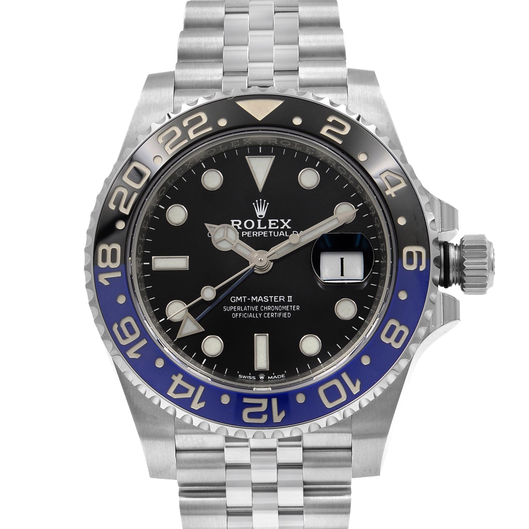 This unworn Rolex GMT-Master II 126710BLNR is a beautiful men's timepiece that is powered by mechanical (automatic) movement which is cased in a stainless steel case. It has a round shape face, date indicator, dual time dial and has sticks and dots