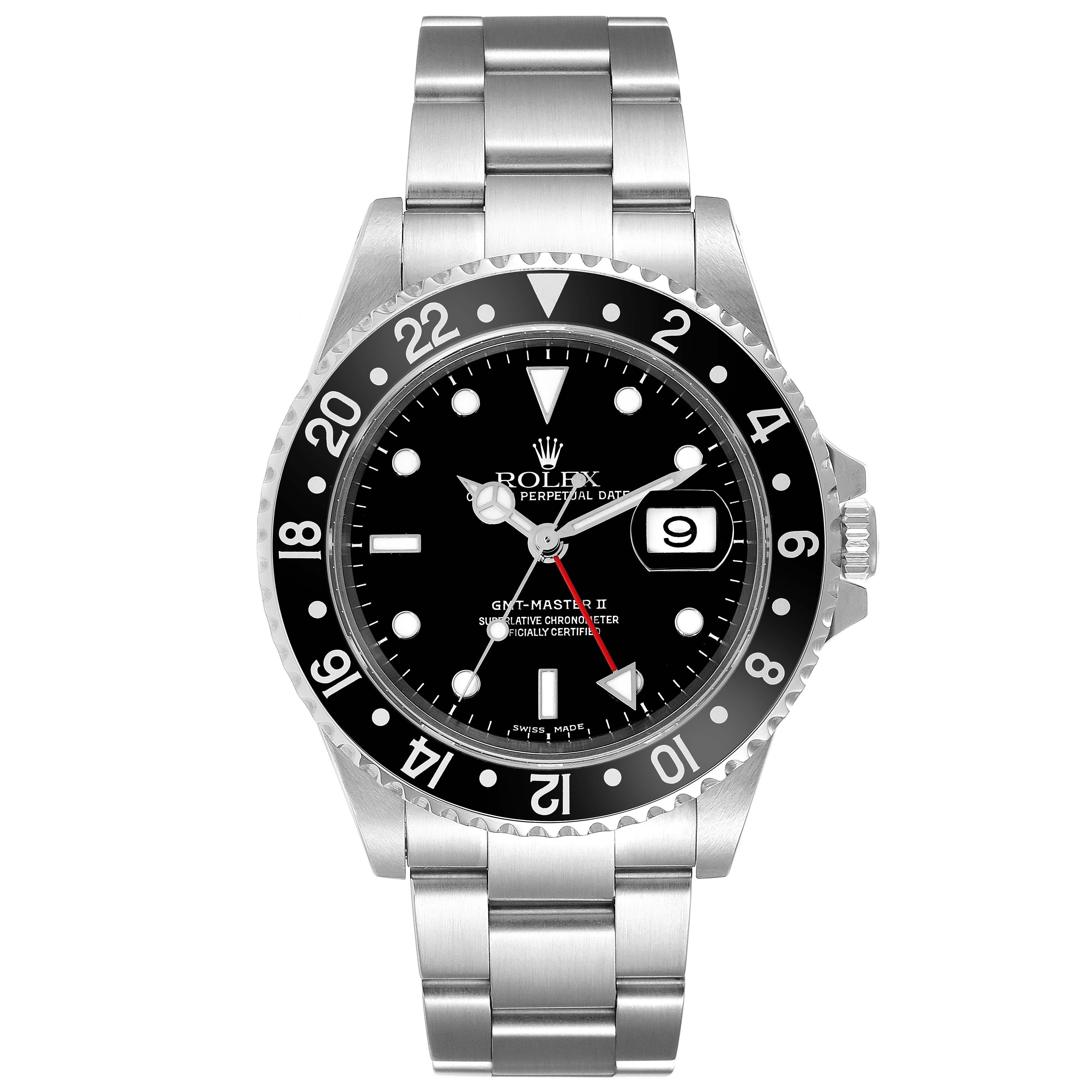 Rolex GMT Master II Black Bezel Dial Steel Mens Watch 16710 Box Papers. Officially certified chronometer automatic self-winding movement. Stainless steel case 40 mm in diameter. Rolex logo on a crown. Bidirectional rotating bezel with a special