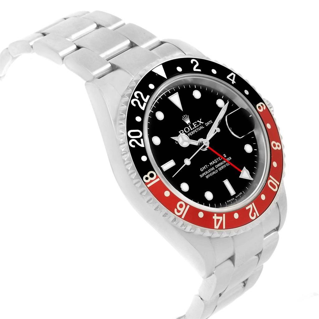 Rolex GMT Master II Black Red Coke Bezel Steel Mens Watch 16710. Officially certified chronometer automatic self-winding movement. Stainless steel case 40.0 mm in diameter. Rolex logo on a crown. Bidirectional rotating bezel with a special 24-hour