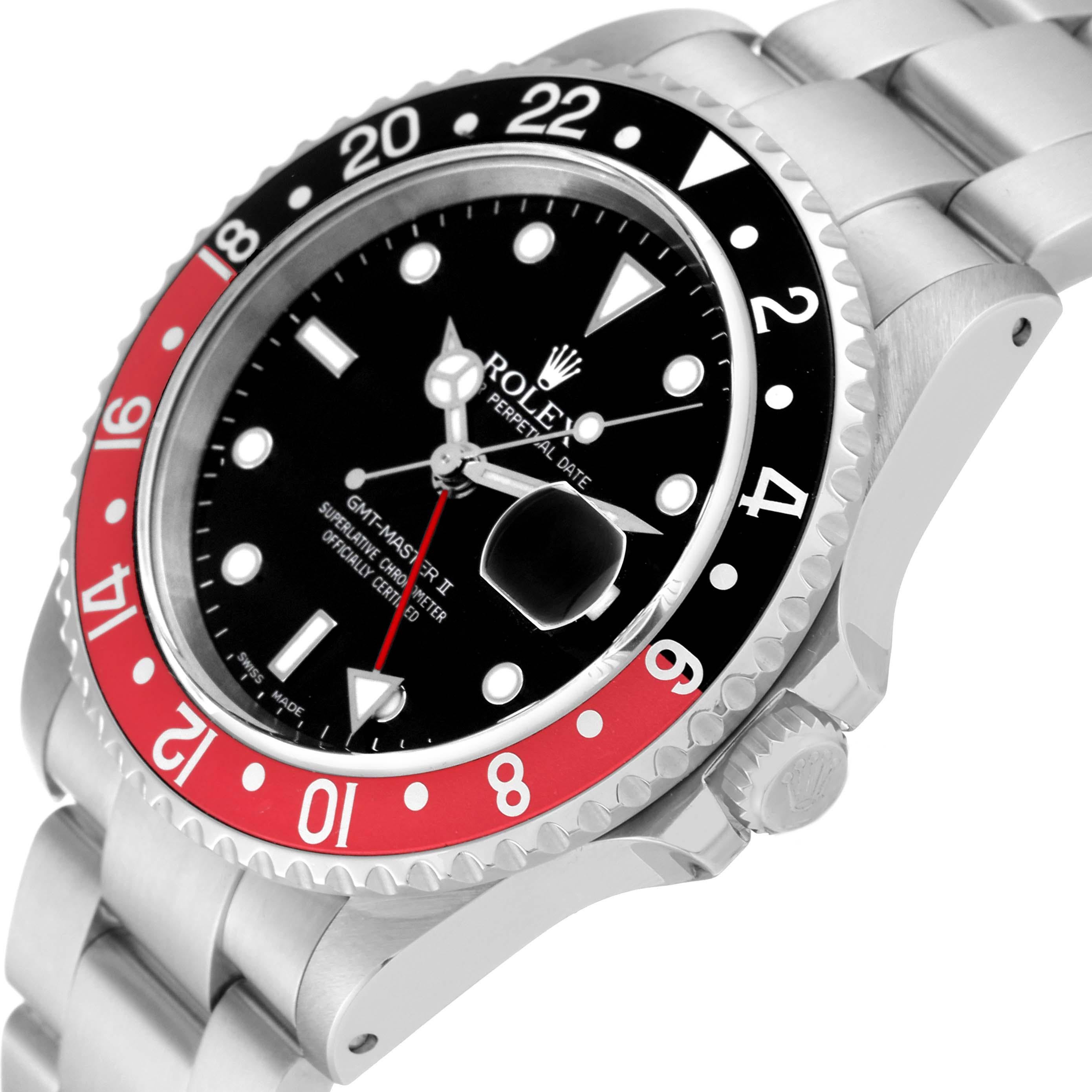 Rolex GMT Master II Black Red Coke Bezel Steel Mens Watch 16710. Officially certified chronometer automatic self-winding movement. Stainless steel case 40 mm in diameter. Rolex logo on the crown. Stainless steel bi-directional rotating bezel with a