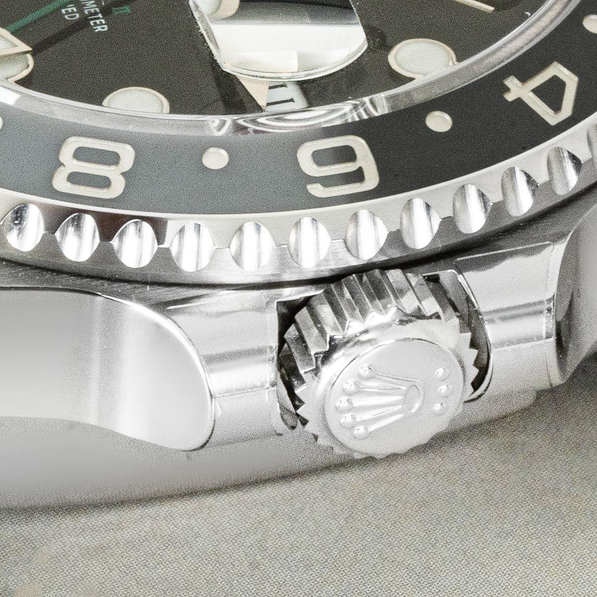 An Oystersteel GMT-Master II by Rolex, referred to as the Bruce Wayne. Features a black dial, complemented by the ceramic black and grey bidirectional rotatable bezel featuring a graduated 24-hour home display.

Presented on a Jubilee bracelet,