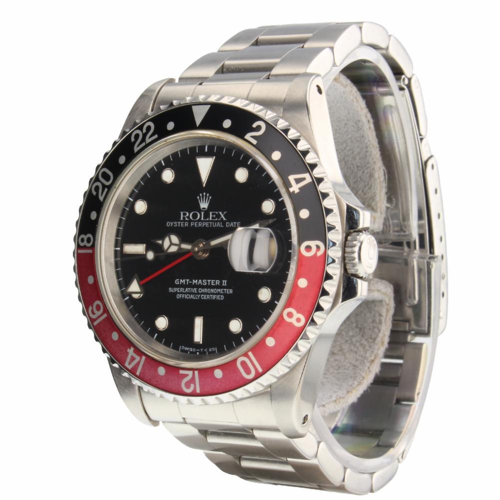 Rolex GMT Master II Reference #:16710. Rolex GMT Master II Coke Bezel Steel 40 mm Black Automatic Watch 16710 Serial W. Verified and Certified by WatchFacts. 1 year warranty offered by WatchFacts.
