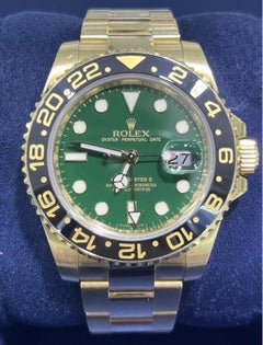 Rolex GMT-Master II GREEN Dial Black Ceramic 18K Yellow Gold 40mm Oyster 116718
