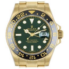 Rolex GMT-Master II Green Dial Watch 116718LN