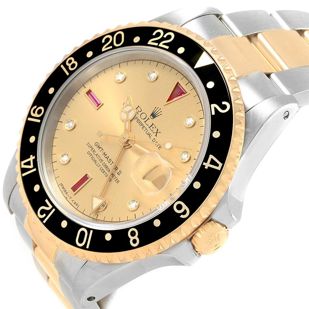 Rolex GMT Master II Mens 18k Yellow Gold Steel Serti Dial Watch 16713. Officially certified chronometer automatic self-winding movement. Stainless steel case 40.0 mm in diameter. Rolex logo on a crown. 18k yellow gold bidirectional rotating bezel