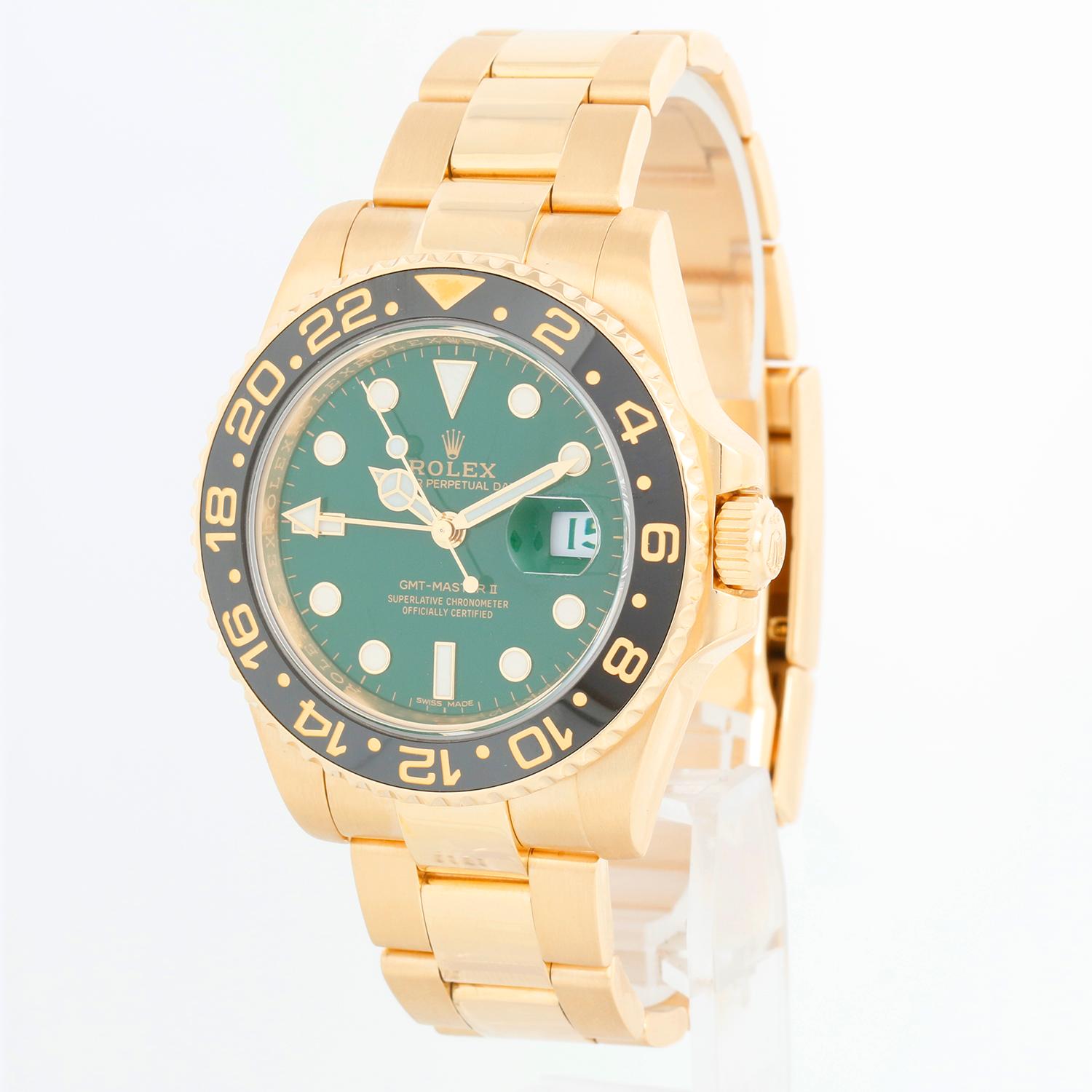 Rolex GMT-Master II Men's 18k Yellow Gold Watch 116718 - Automatic winding, 31 jewels, Quickset, sapphire crystal. 18k yellow gold case; rotating bezel with black ceramic insert. Green dial . 18k yellow gold Oyster bracelet with flip-lock clasp.