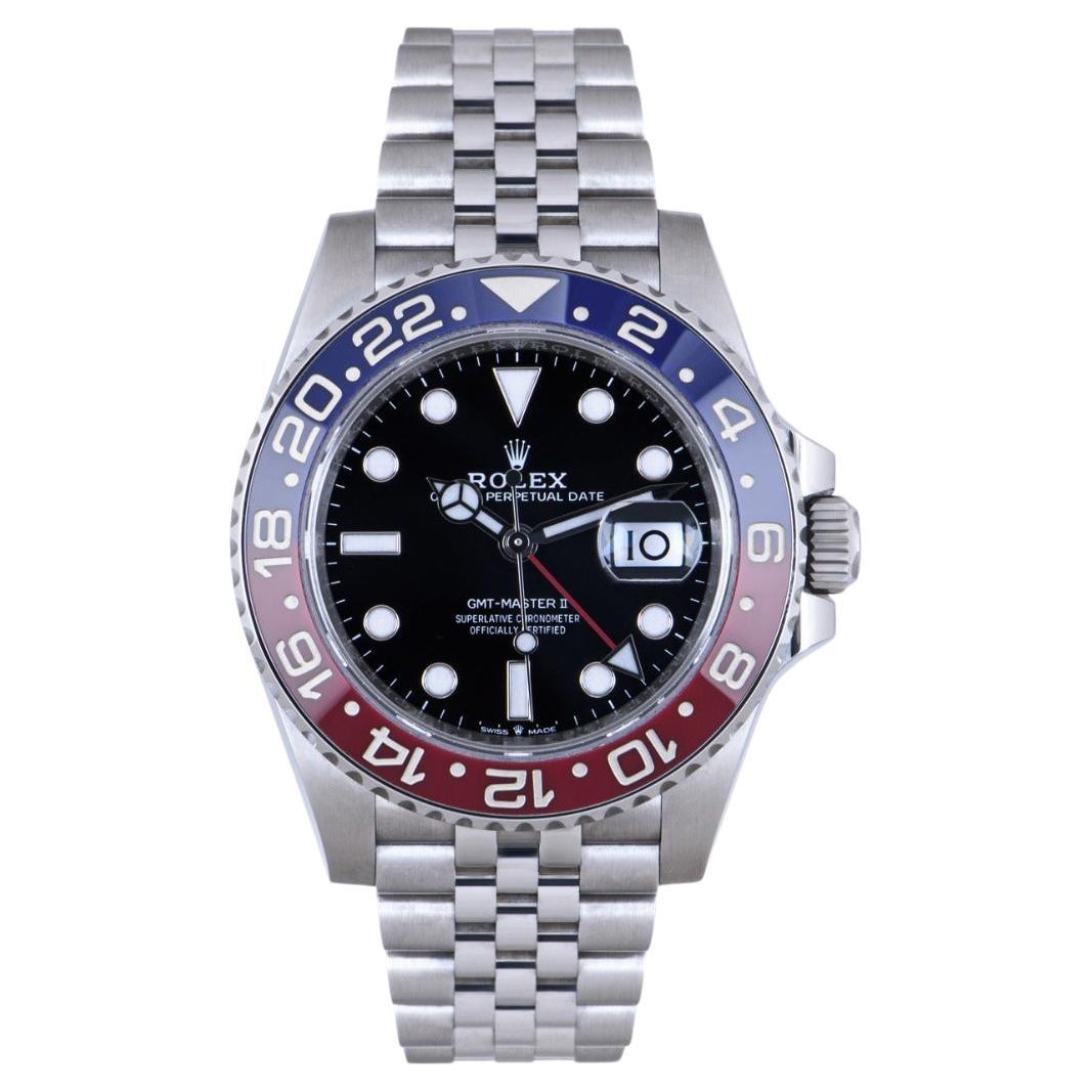 An unworn GMT-Master II Pepsi in Oystersteel from Rolex. Features a black dial with the date and red time zone hand. The blue and red bidirectional rotatable ceramic bezel also features a 24 hour display.

The Jubilee bracelet comes with the folding