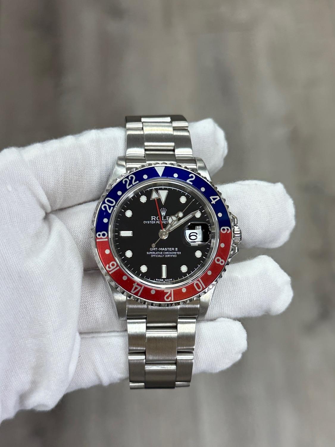 Rolex GMT Master II Pepsi 16710 40mm Bisel rojo y azul Caja de acero Papeles 2006 en venta 2
