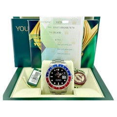 Rolex GMT Master II Pepsi 16710 40mm Bisel rojo y azul Caja de acero Papeles 2006