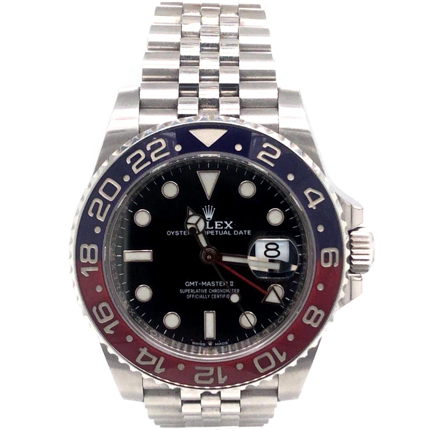 This Rolex GMT-Master II 126710BLRO Pepsi Blue & Red Bezel Stainless Steel Automatic Watch features a black dial and a two-color Cerachrom bezel insert in red and blue ceramic. Designed to show the time in two different time zones simultaneously