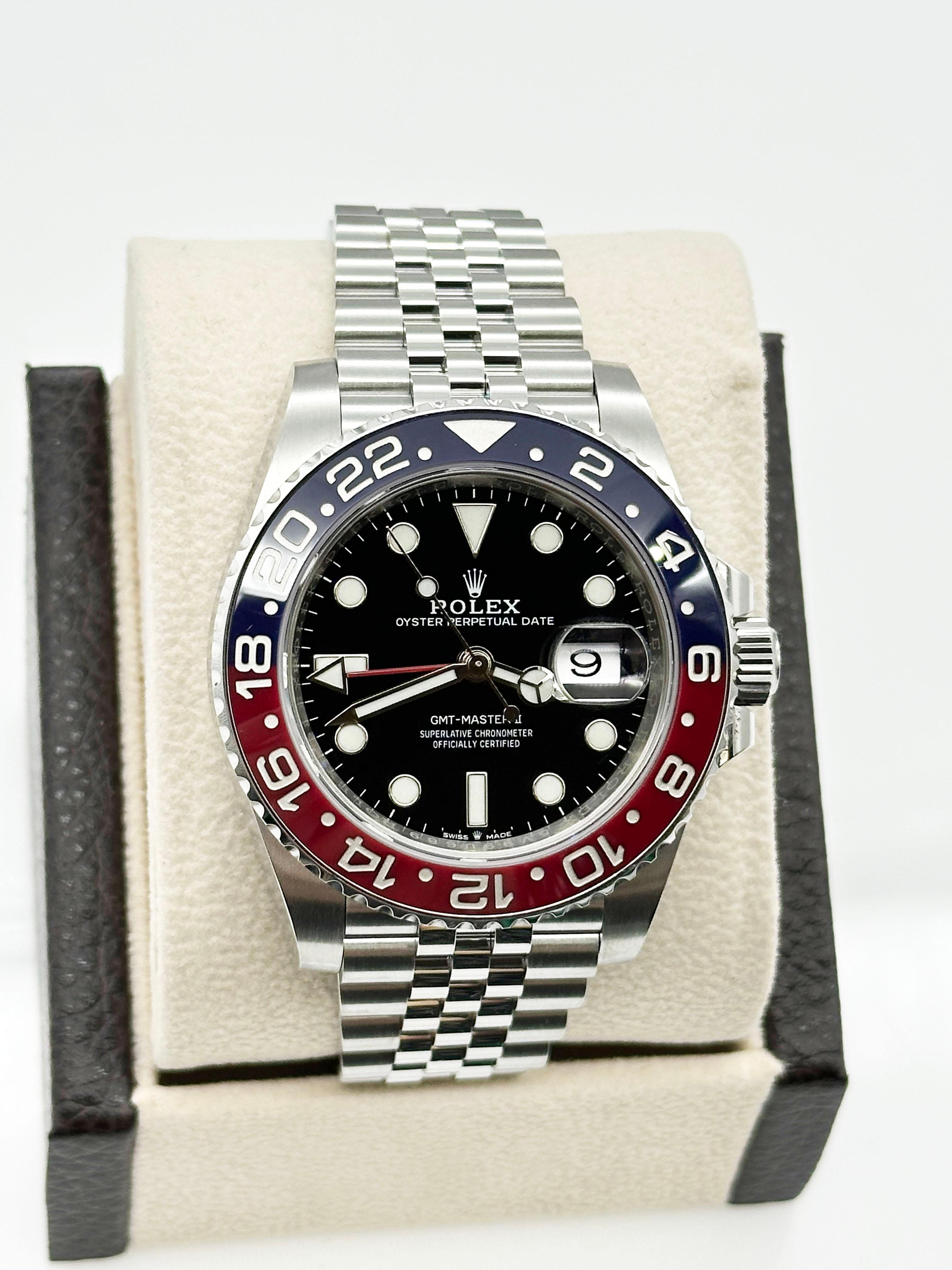 Rolex GMT Master II Pepsi Jubilee 126710BLRO Bisel Cerámico Caja Inoxidable Papel 1