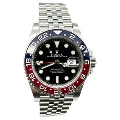 Rolex GMT Master II Pepsi Jubilee 126710BLRO Bisel Cerámico Caja Inoxidable Papel