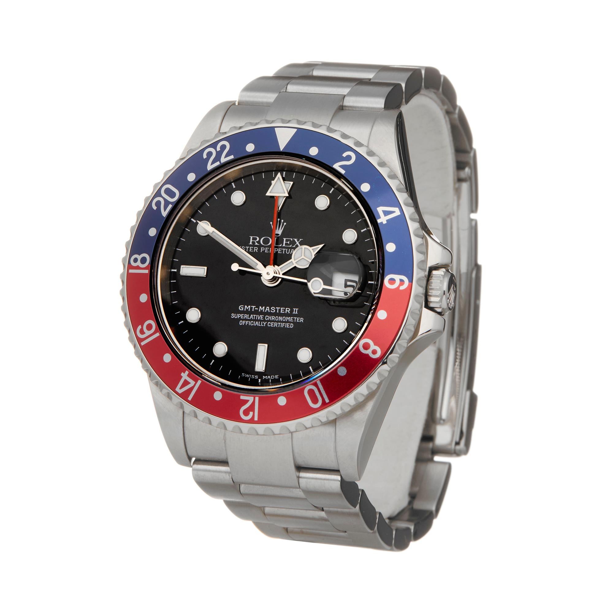 Ref: W6143
Manufacturer: Rolex
Model: GMT-Master II
Model Ref: 16710
Age: 7th April 2005
Gender: Mens
Complete With: Box, Guarantee, Original Swing Tags & Service Pouch
Dial: Black 
Glass: Sapphire Crystal
Movement: Automatic
Water Resistance: To