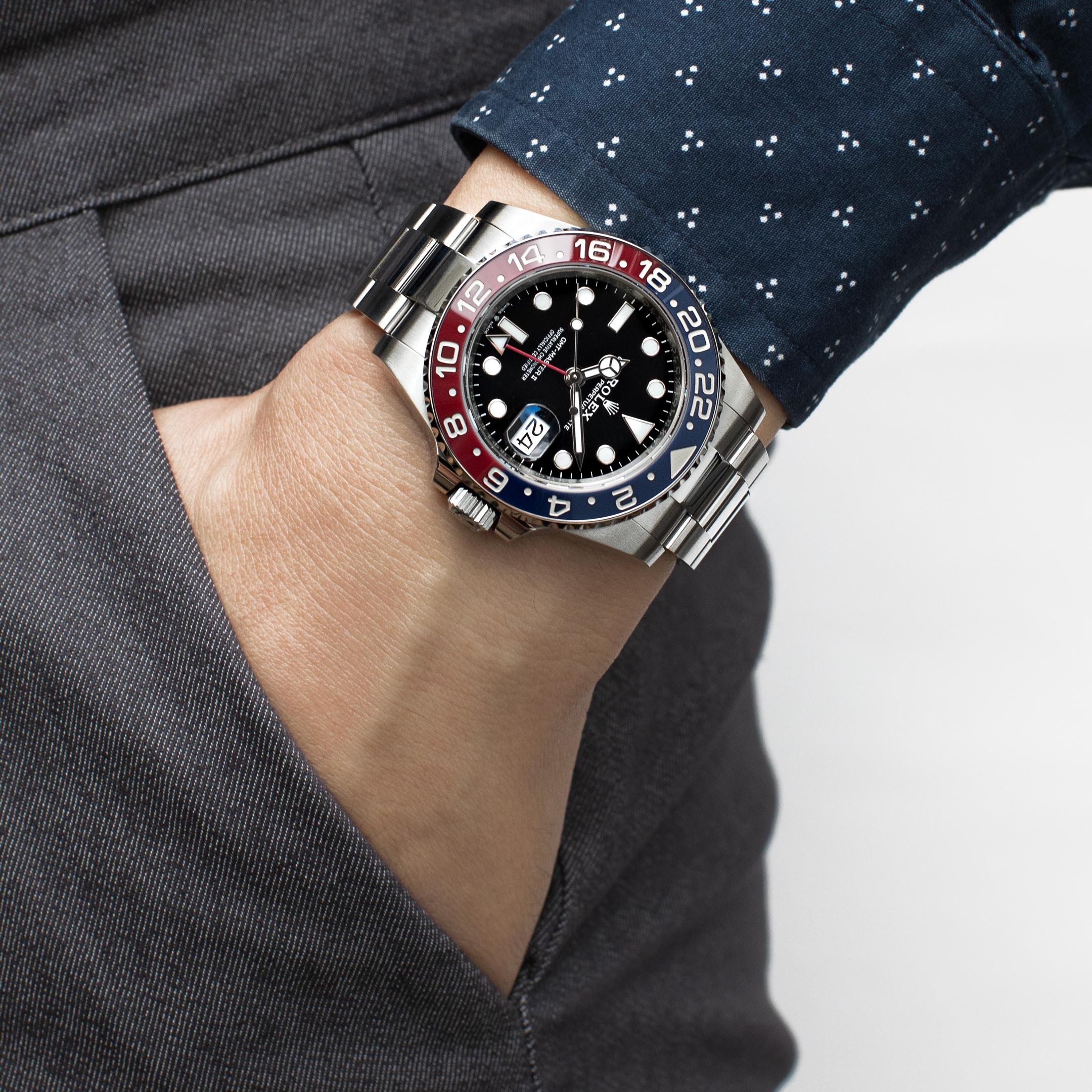 The Rolex GMT Master II is one of Rolex's finest creations. The case measures 40mm and is made of stainless steel, featuring a red and blue 
