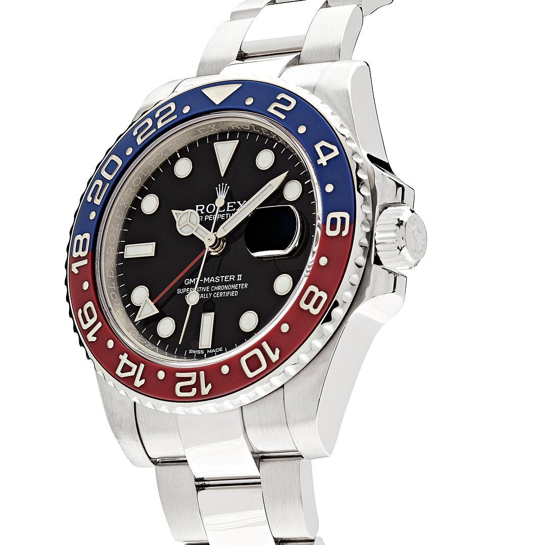 The Rolex GMT Master II is designed in a 40mm 18k white gold case featuring red and blue 